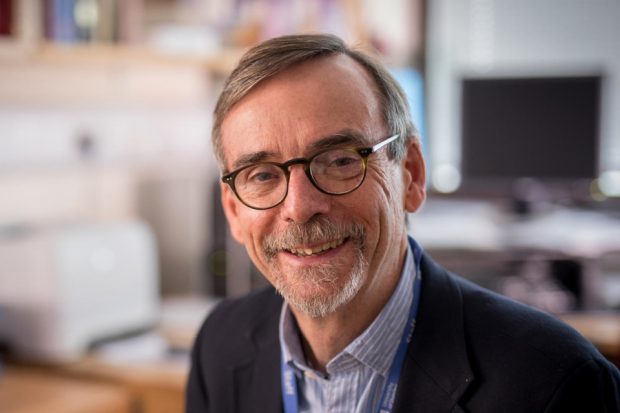 Professor Bob Steele smiling from an office location